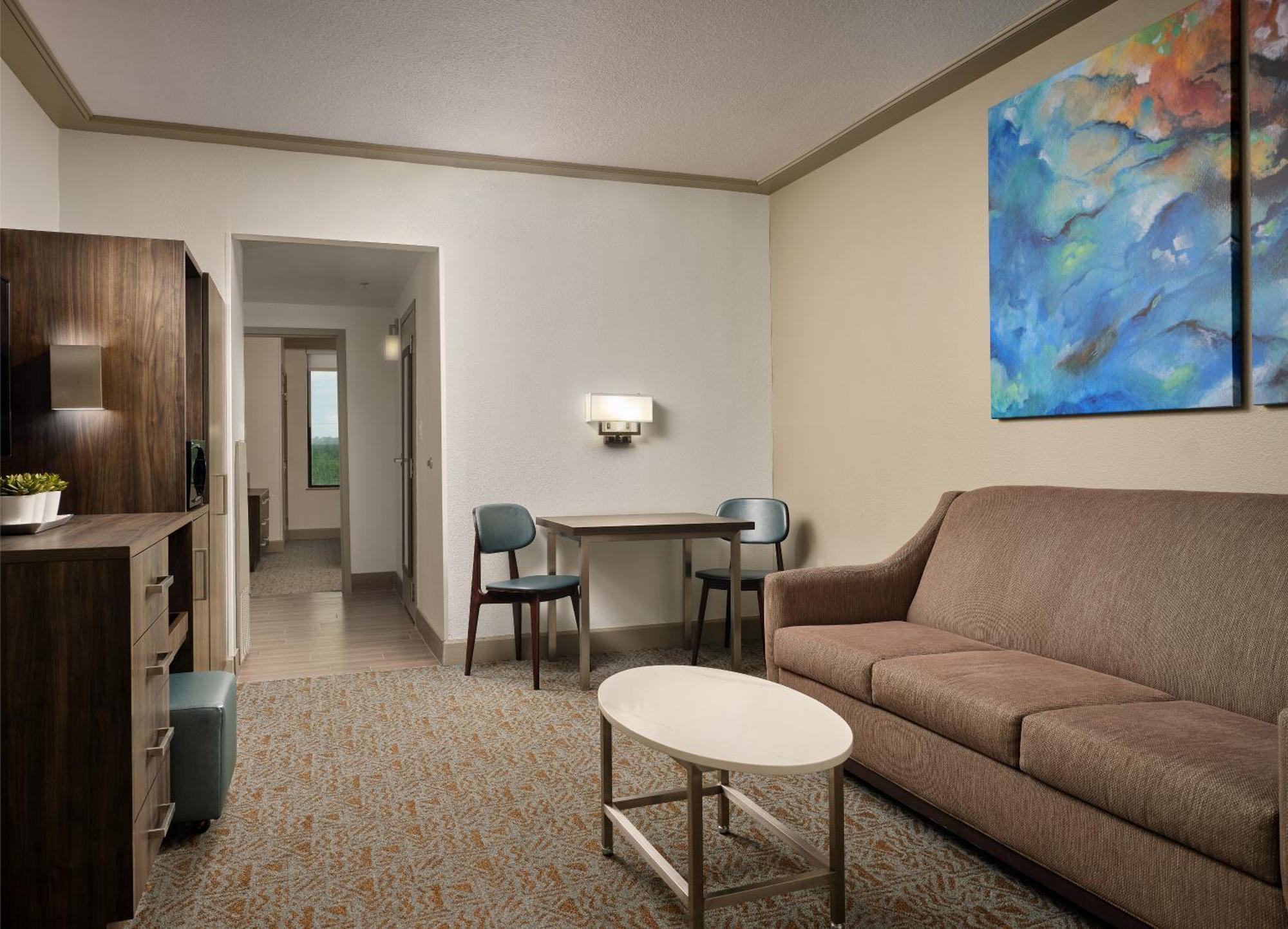 Buena Vista Suites Orlando Lake Buena Vista Kültér fotó A living room in a hotel room